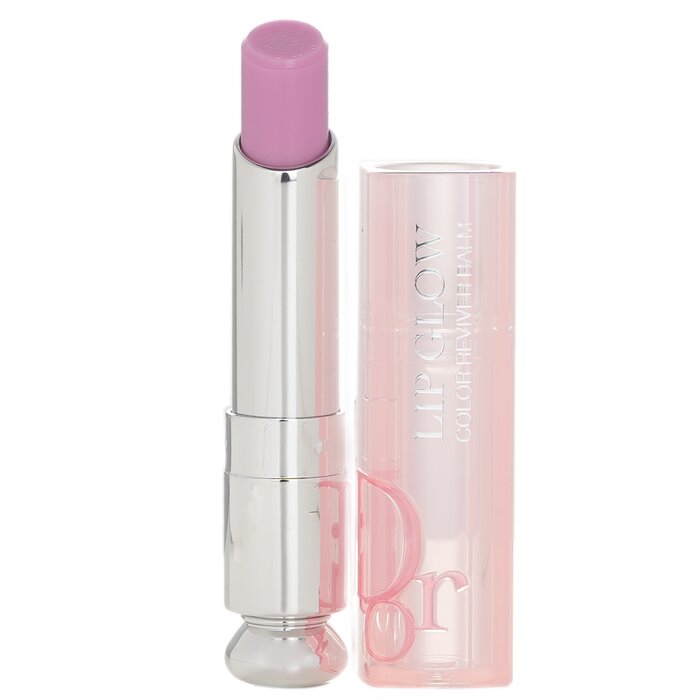 A custom color reviving lip balm Reinvented with a sensorial texture for lips that are both beautified & protected from dryness Thanks to the color reviver technology, it reacts with the moisture level of the lips to reveal a custom color & a subtle shine, to instantly boost the glow Formulated with 97% natural-origin ingredients Infused with cherry oil which help reconstruct & strengthen the natural barrier function of lips skin over the course of applications Developed with Shea butter to wrap skin in a soft cocoon Enriched with Sunflower & rice waxes which guarantee a stick with greater solidity & fuse with skin to release just the right dose of lip care Subtly revives the natural color of lips & hydrates lips for all day Leaves lips luscious, smooth, comfortable & nourished Multi-use, can be worn on its own as a lip balm or as a primer under lipstick Available in a rage of shades to suit all skin tones